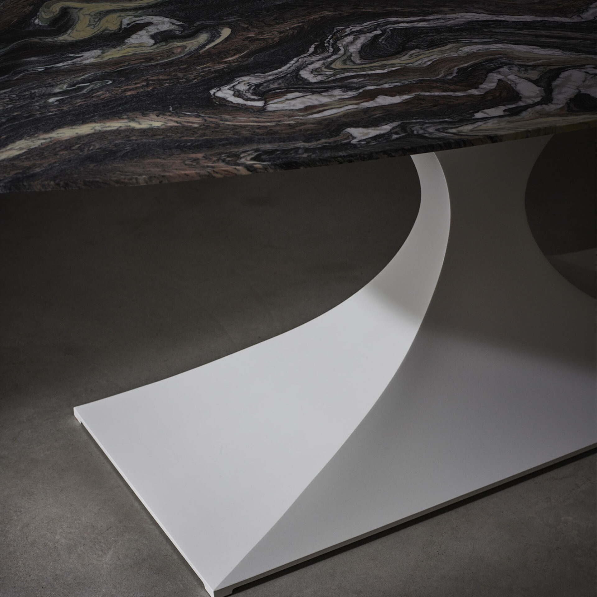 Capricorn oval dining table in white with Rosso Luana Verde marble top detail