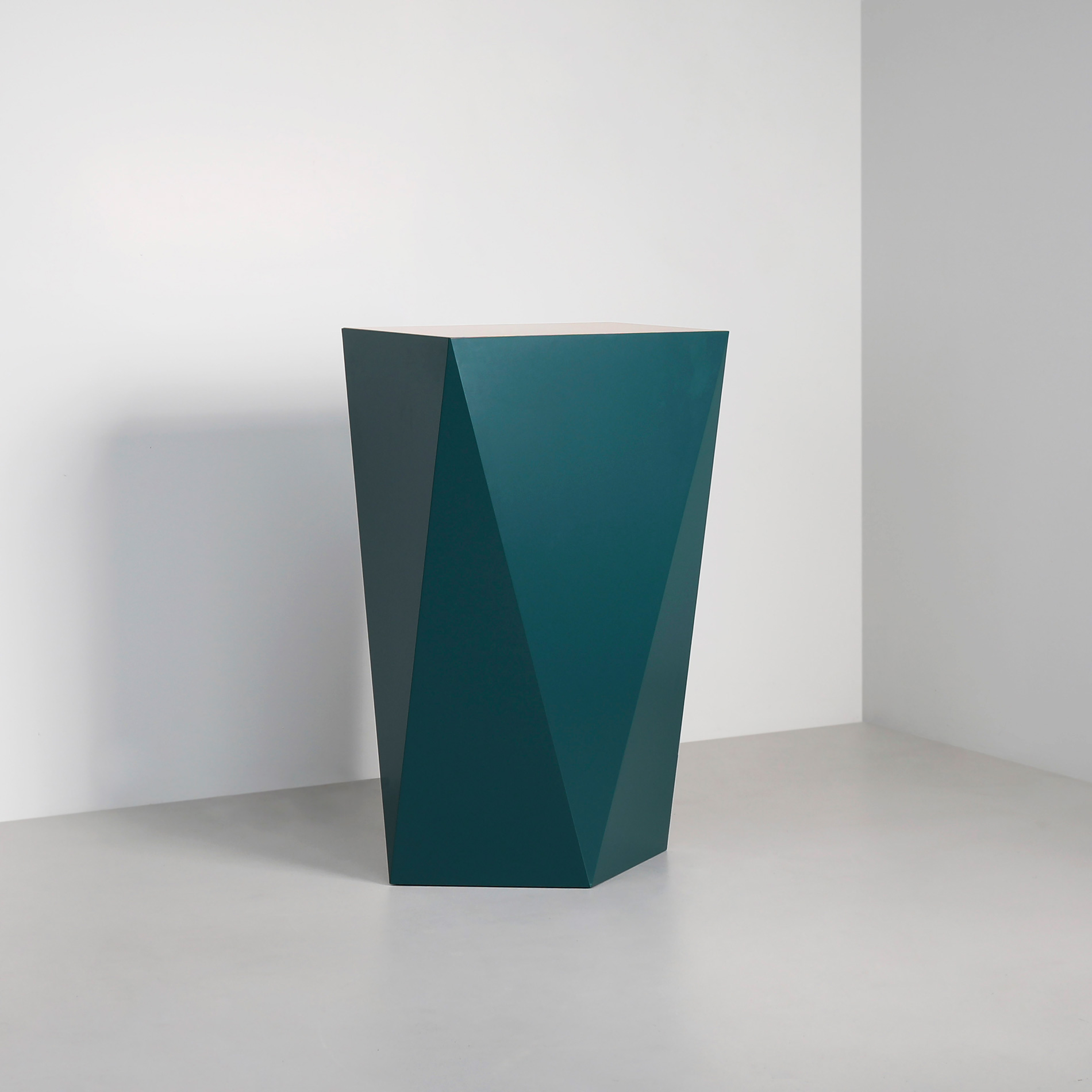 Finished in "Teal" with satin polished Bronze top