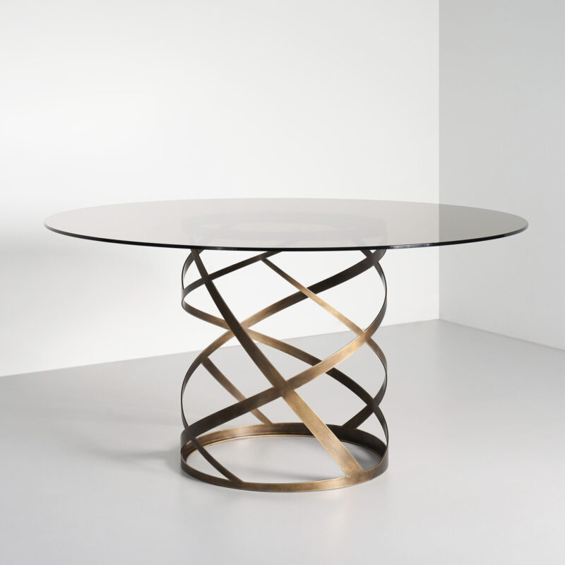 Luxury round dining table with smoked glass top and spiral pedestal base