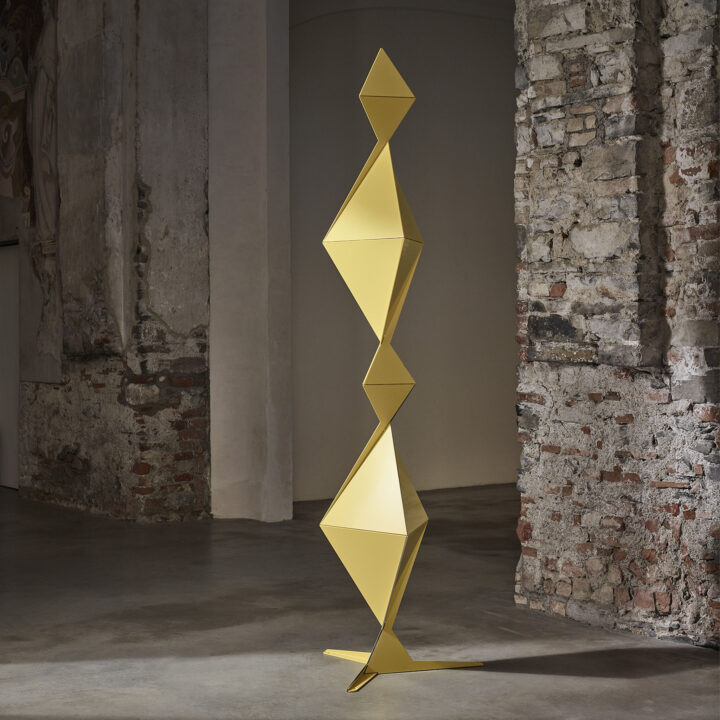 yellow metal sculpture