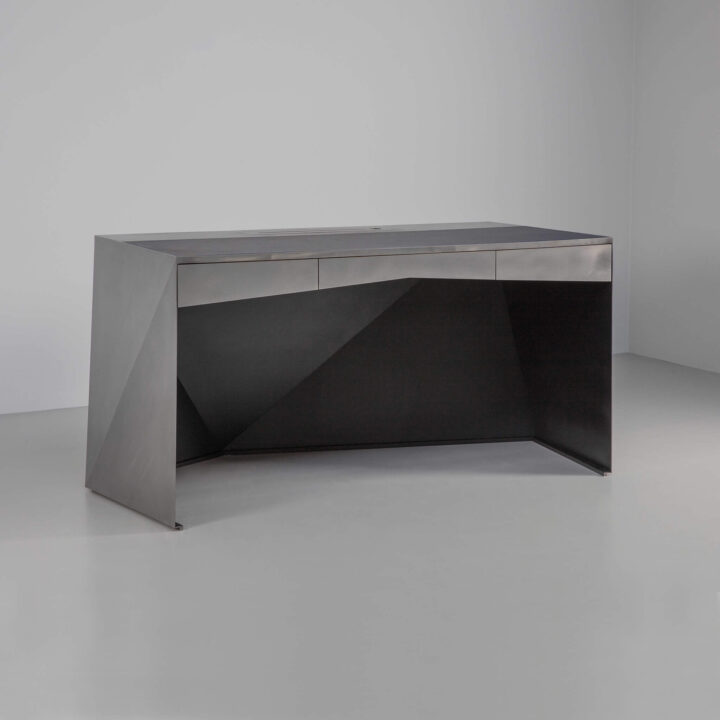 Dull polished steel finish with leather top