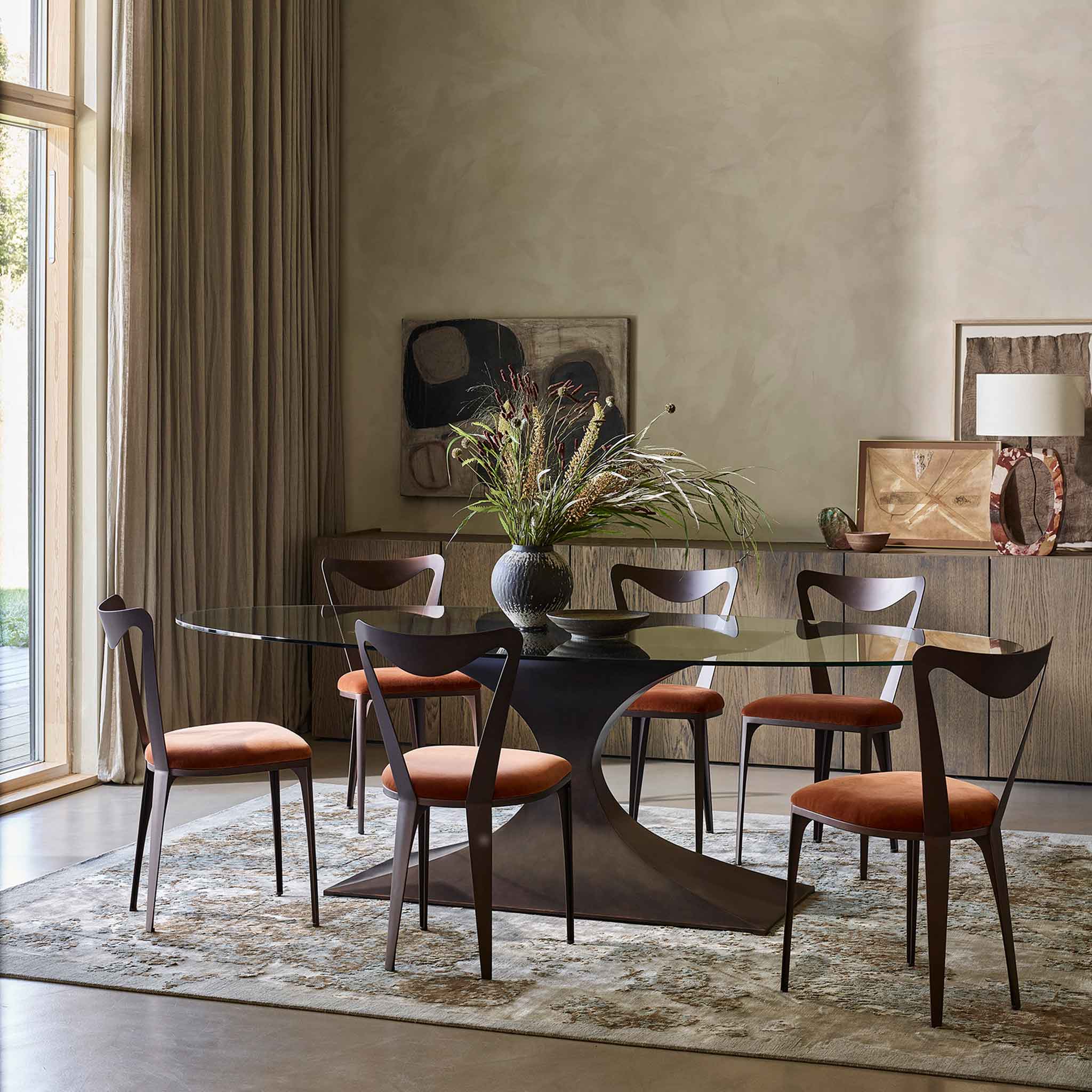 Capricorn dining table and Tiffany chairs