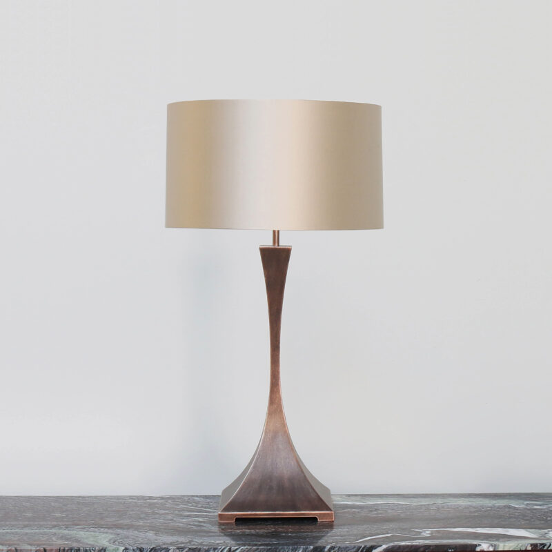 curved patinated designer lamp