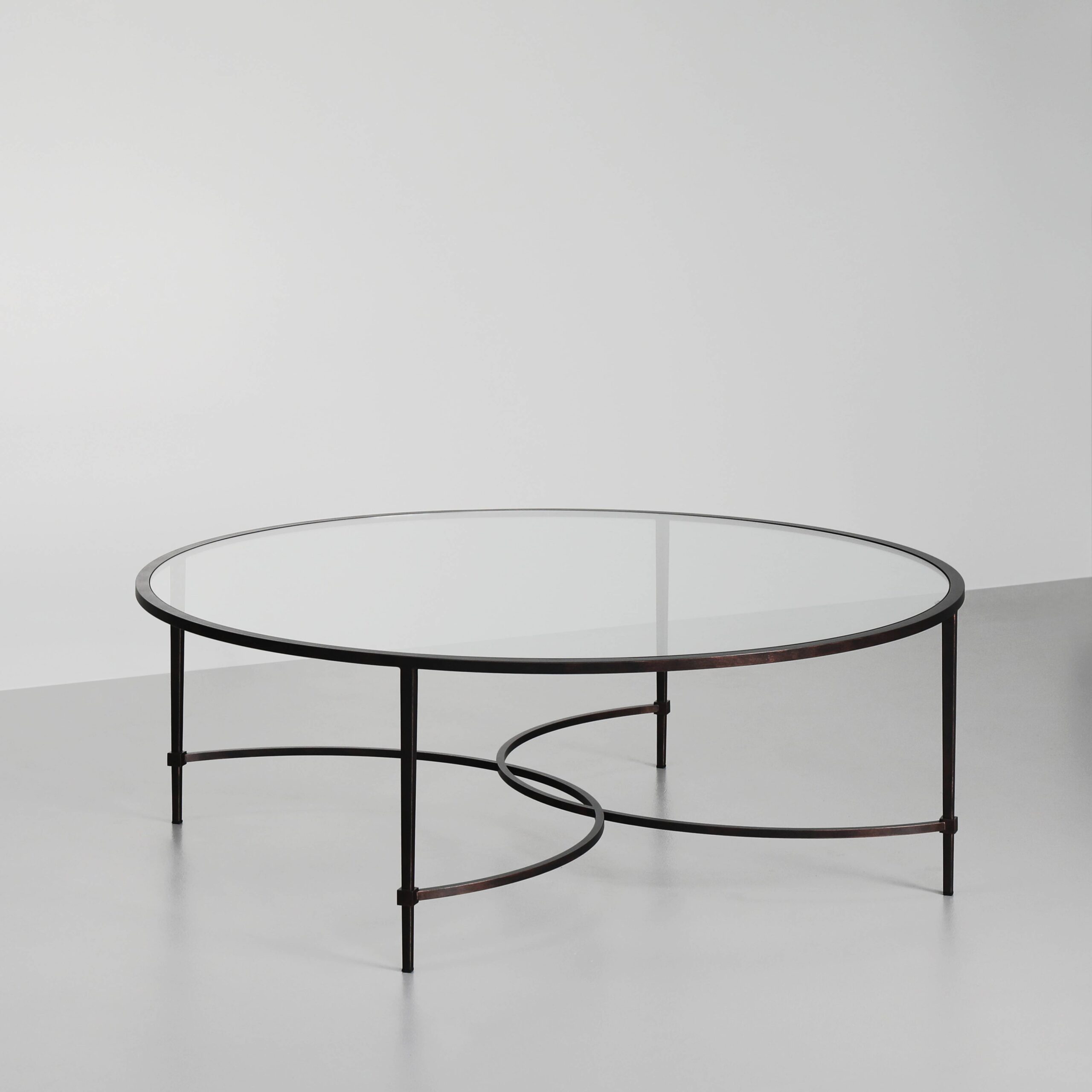 Finished in "Antique Bronze" with a clear glass top