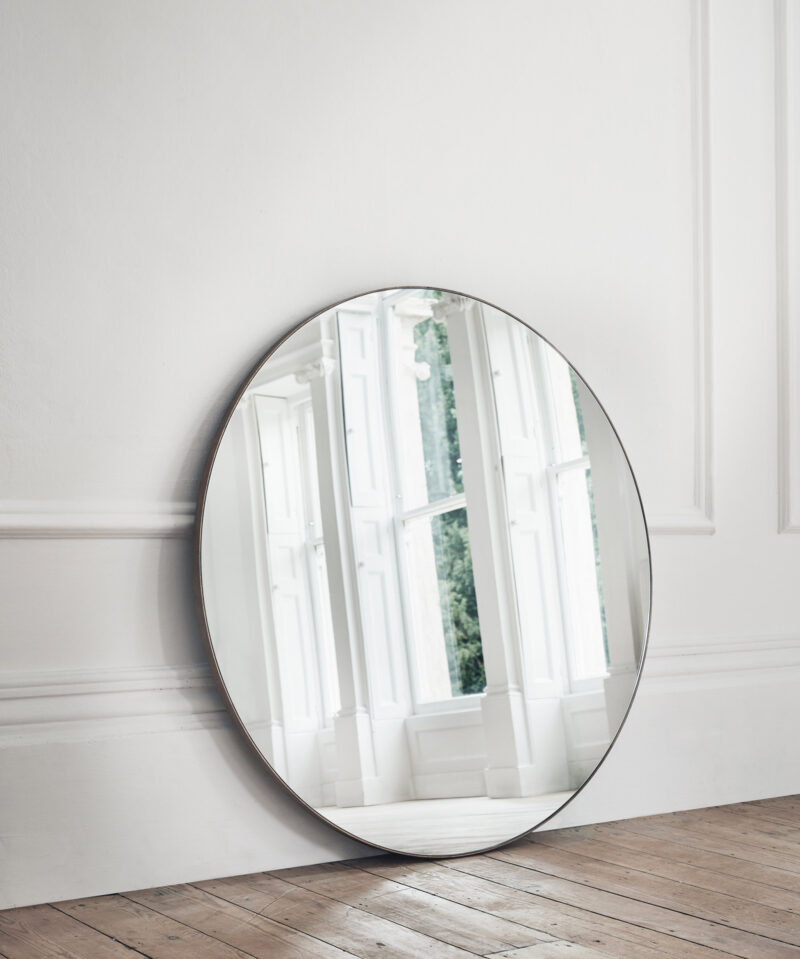 large round contemporary designer mirror