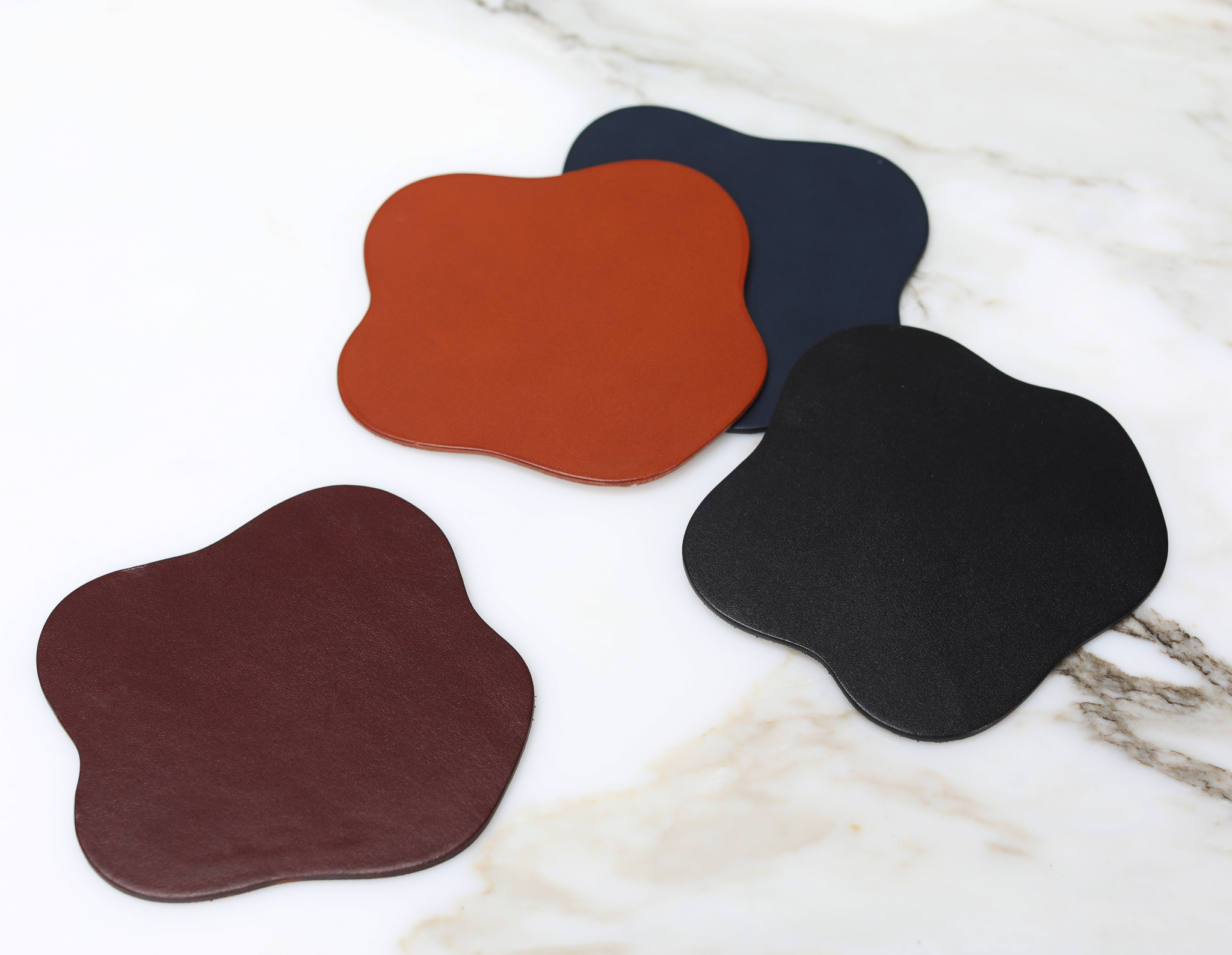 Leather colours in Tan, Navy, Black and Brown