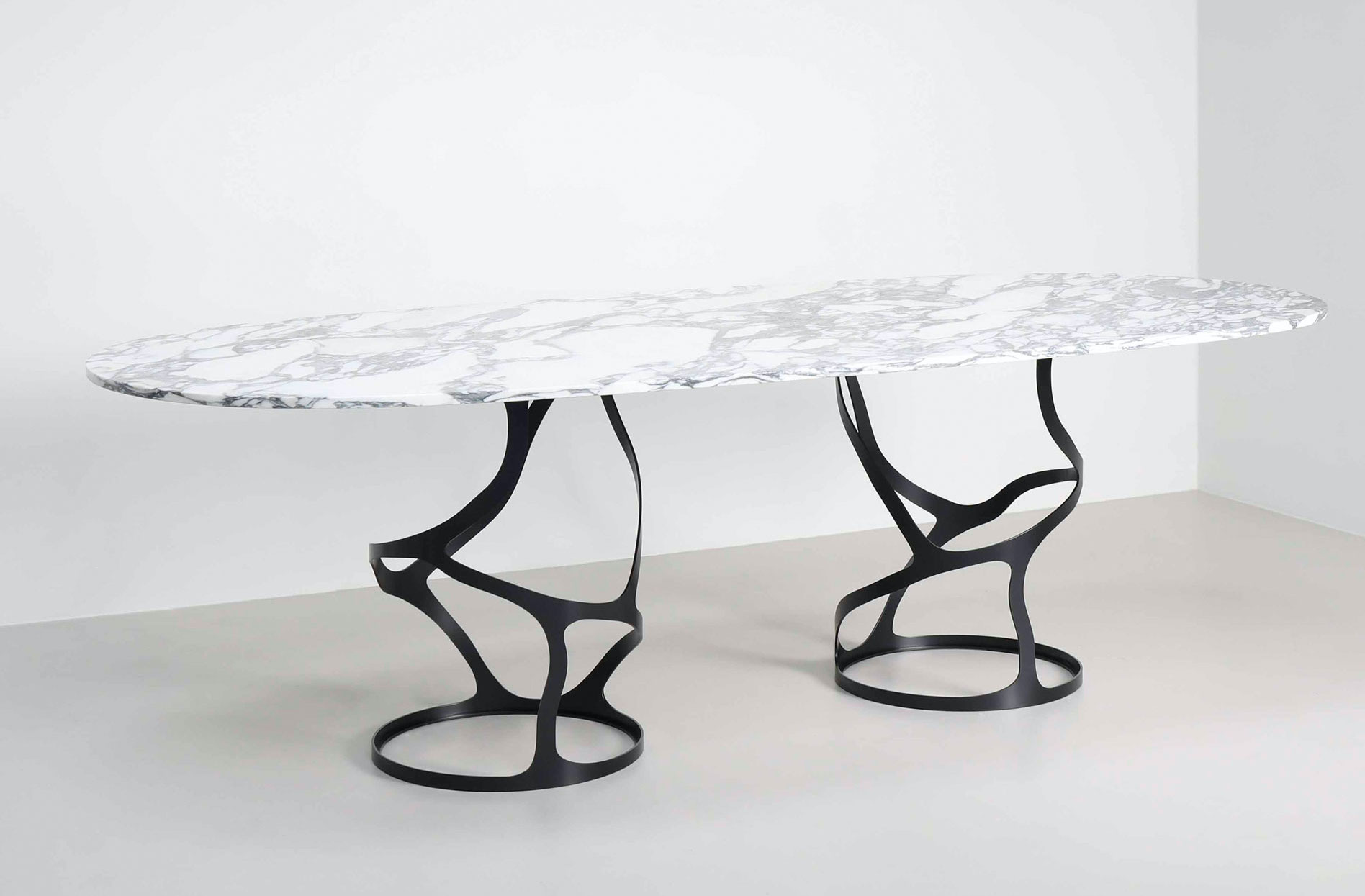 Double Pedestal Papillon Oval Dining Table in Charcoal with an Arabescato marble top