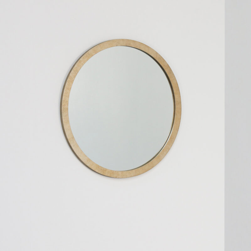 round contemporary designer mirror in gold