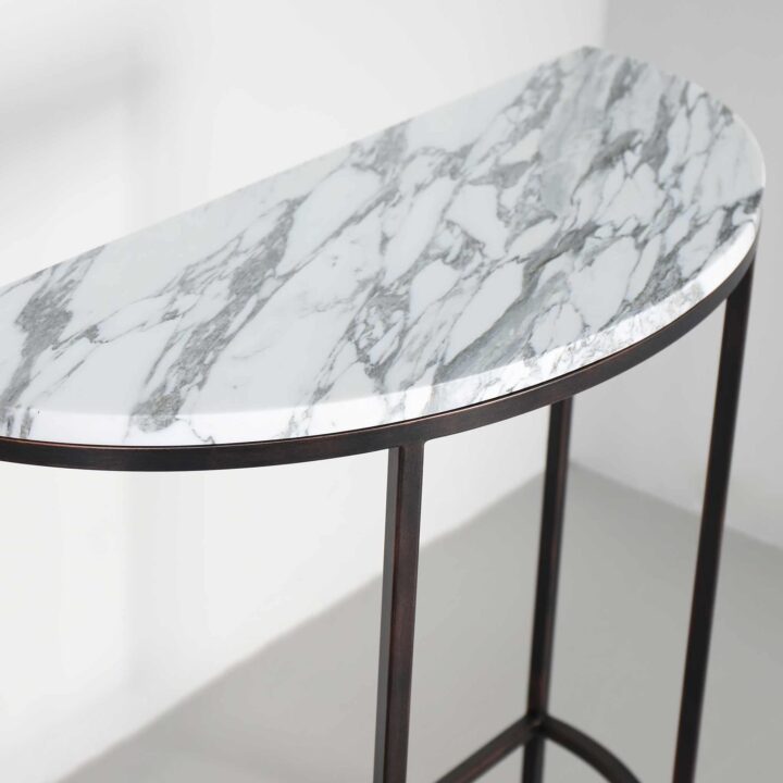 Finished in "Antique Bronze" with Arabescato marble top