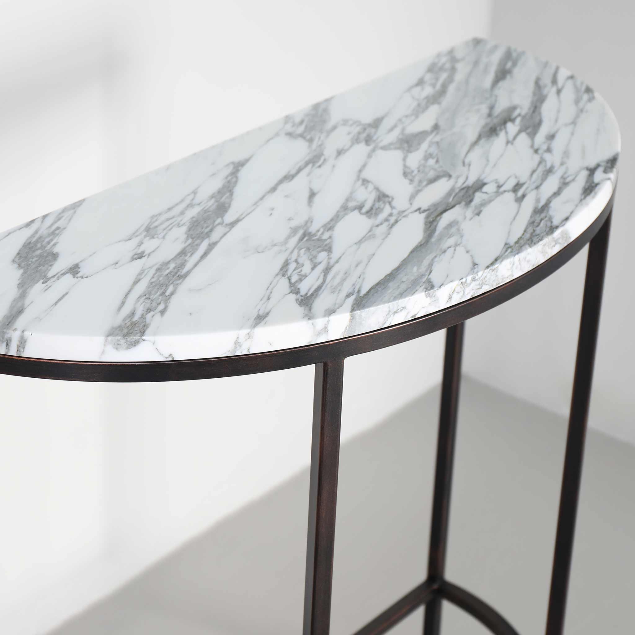 Finished in "Antique Bronze" with Arabescato marble top