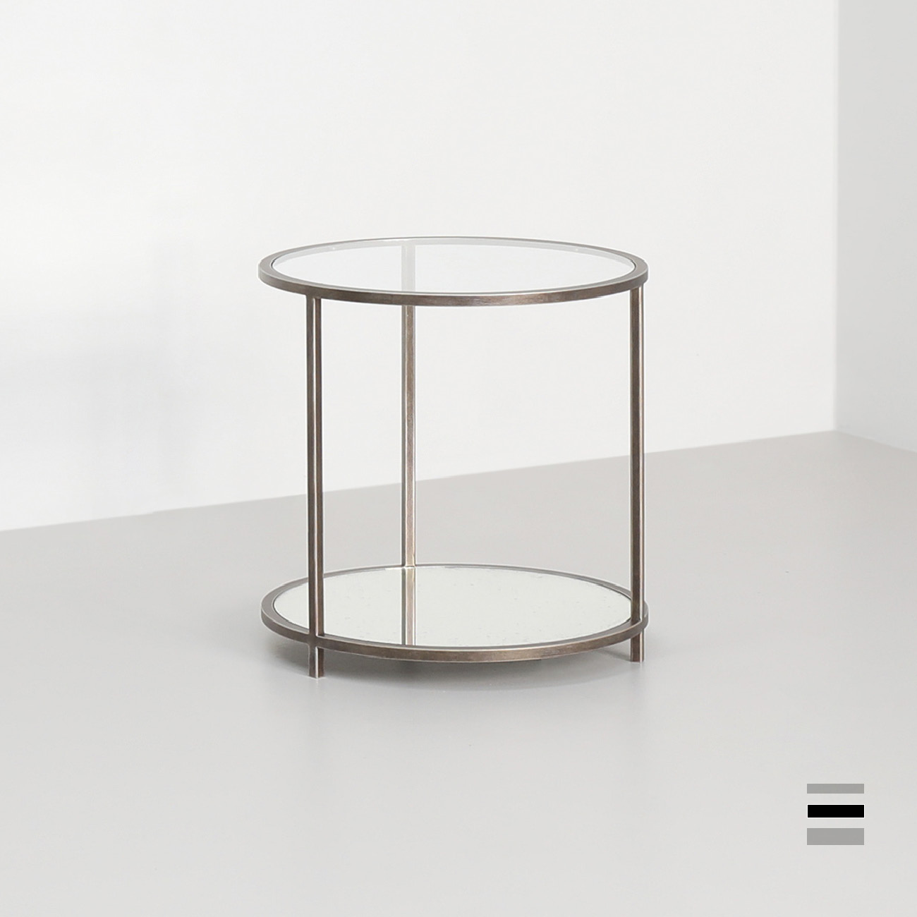 Madison round side table finished in "Rose Pewter" 
