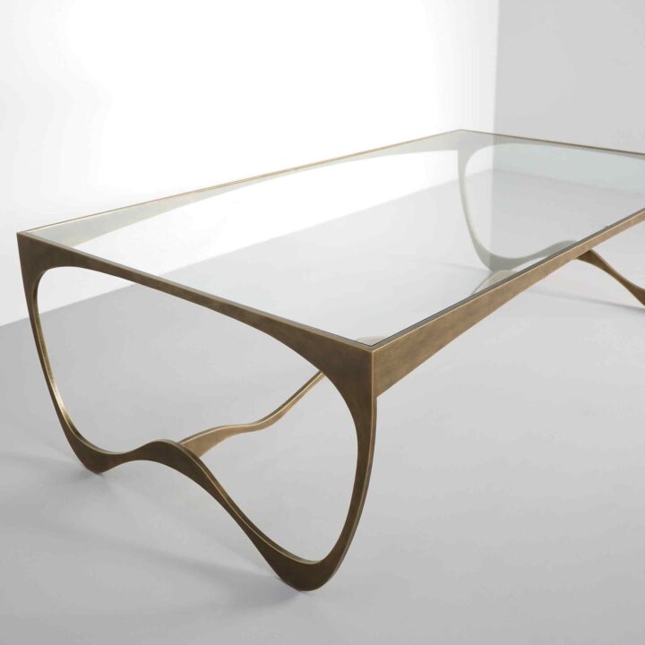 Finished in "Florentine Gold" with a clear glass top
