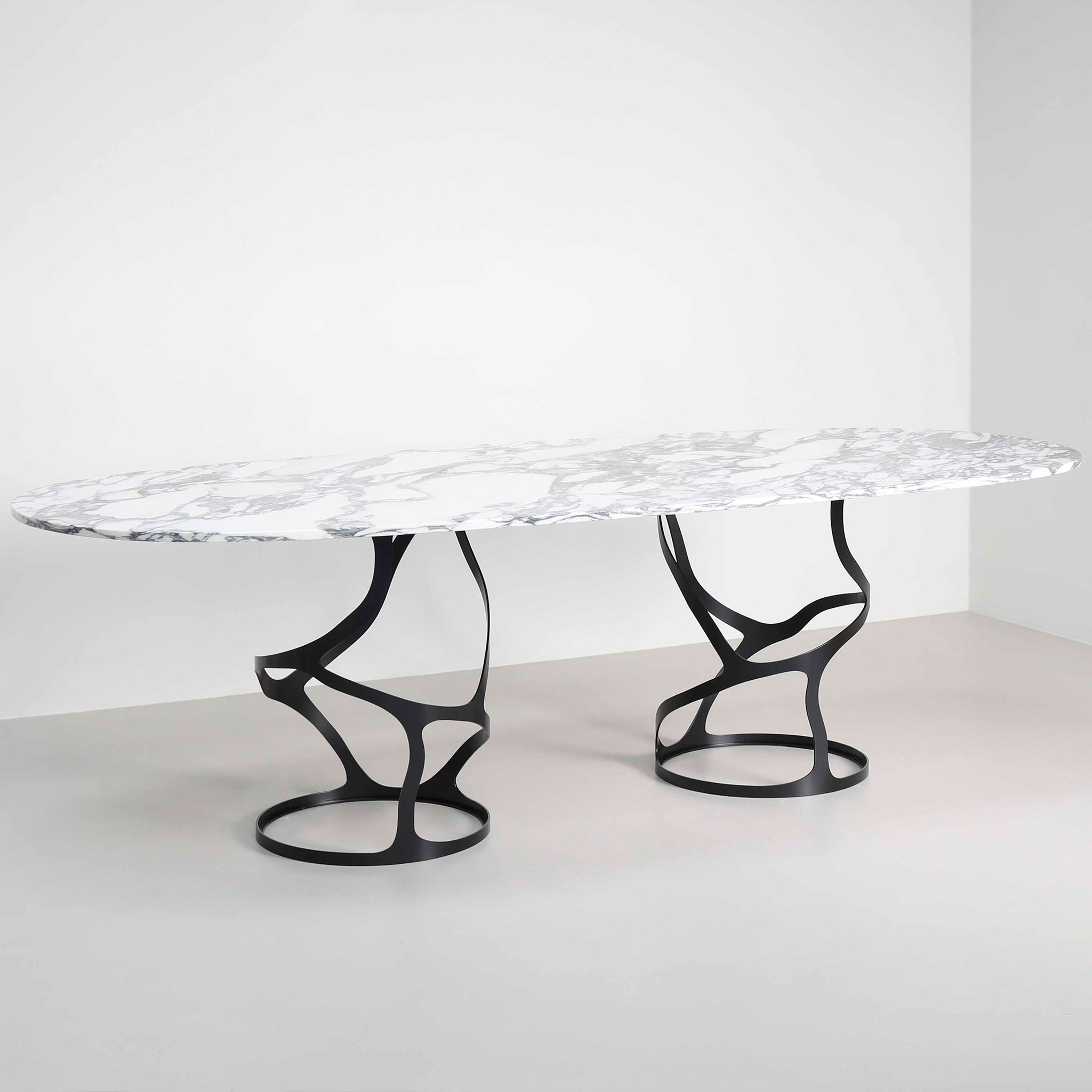 Charcoal base with Arabescato marble top 