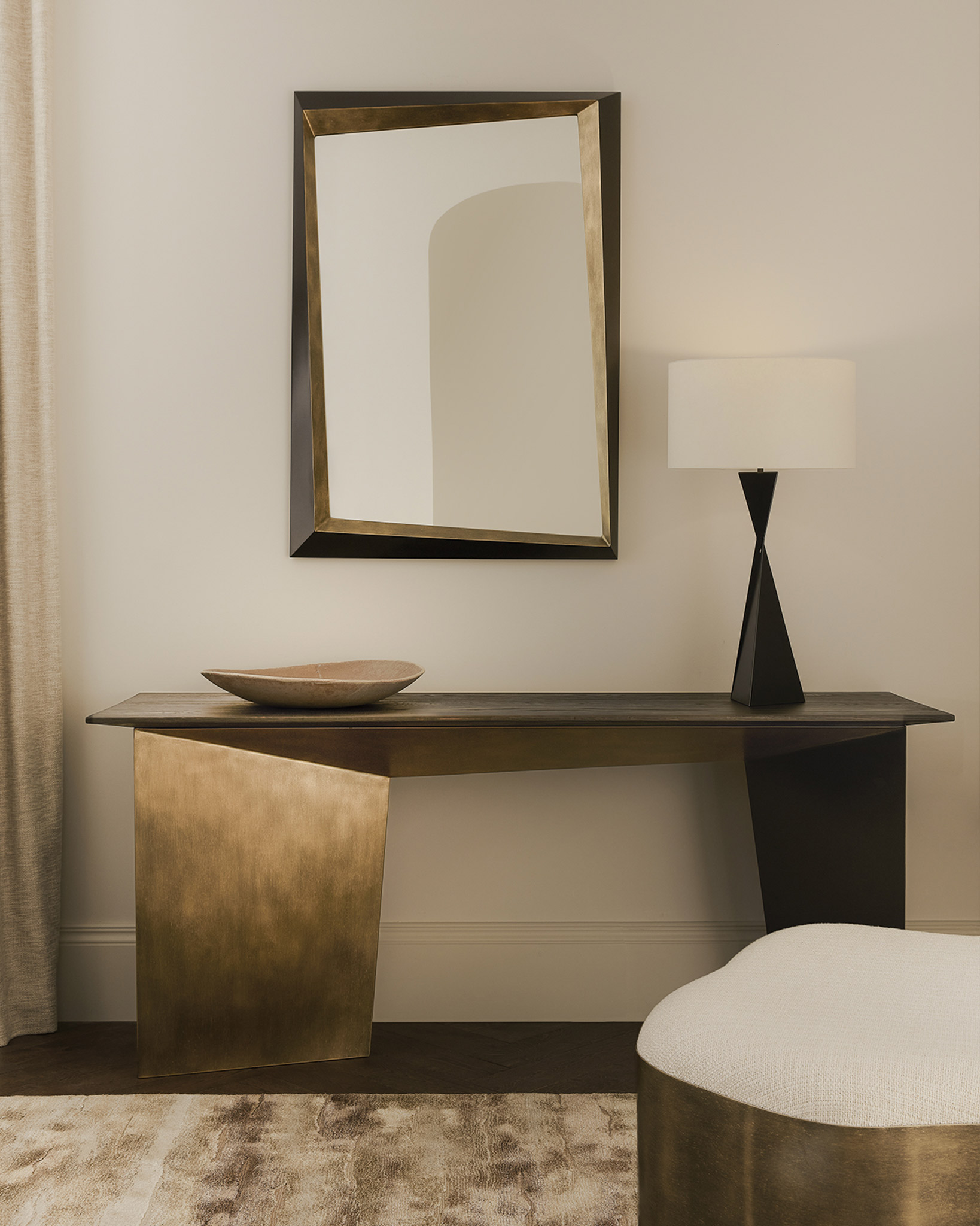 Finished in Florentine Gold with Ebonised Oak top. Pictured with Lily ottoman, Ava lamp and Phoenix mirror