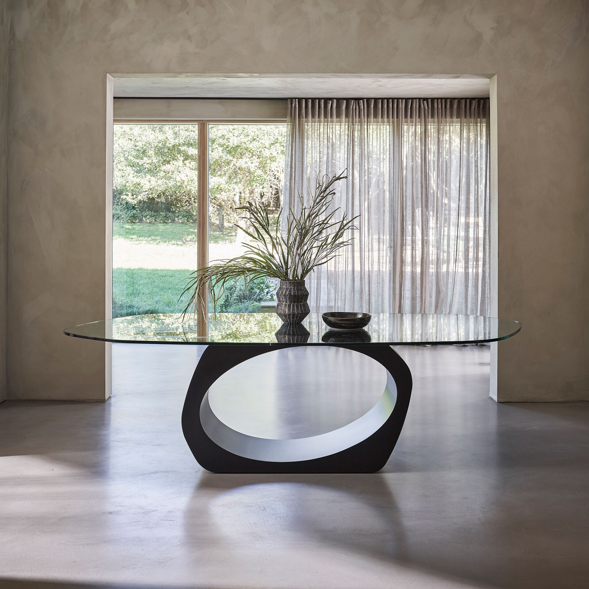 Skye dining table finished in Matt Black