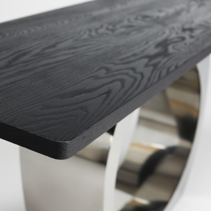 Finished in a "Satin Polished Stainless Steel" with a scorched wood top