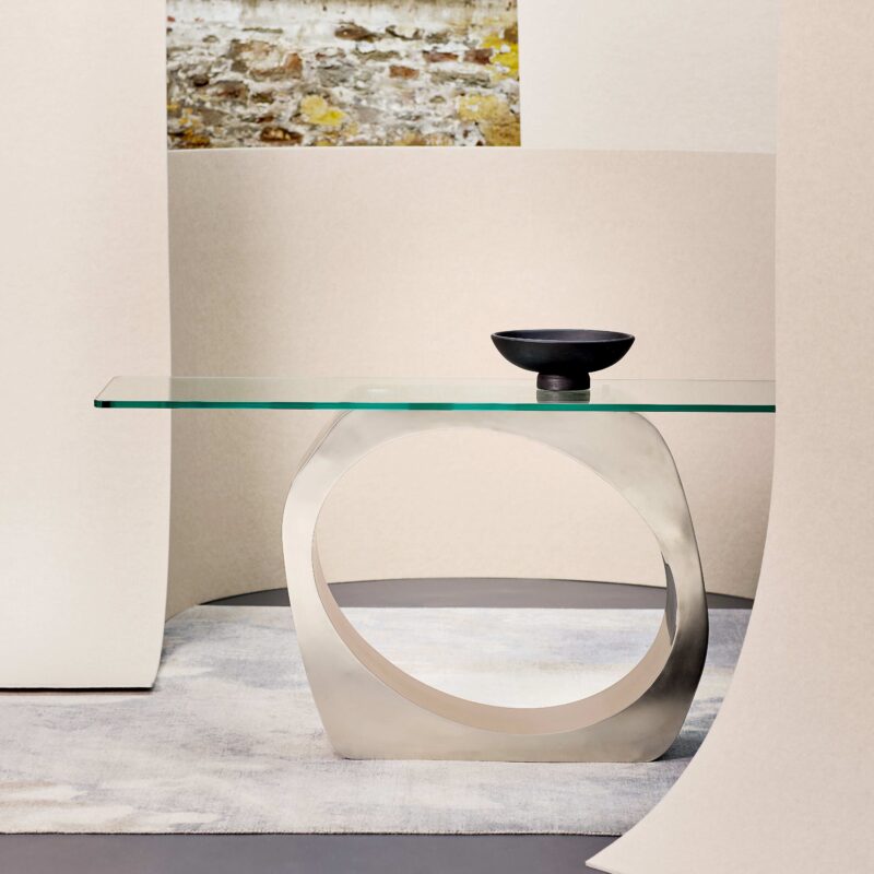 sculptural console table with glass top