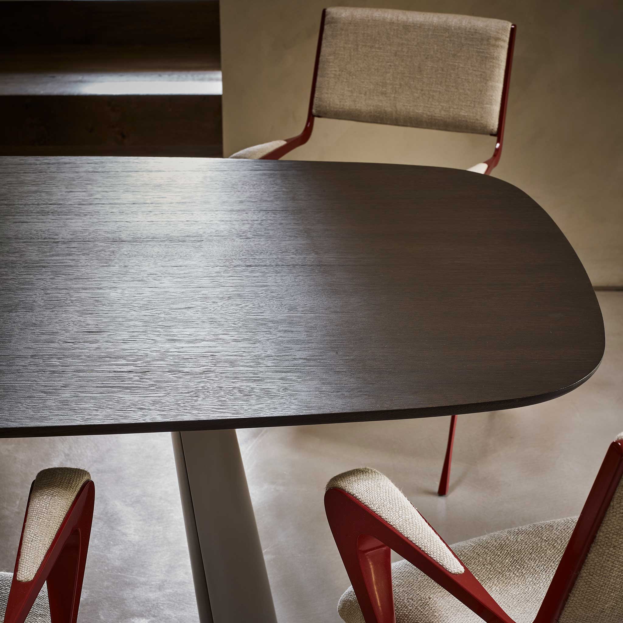 Vale dining table with darkened walnut top and Vienna carver chairs