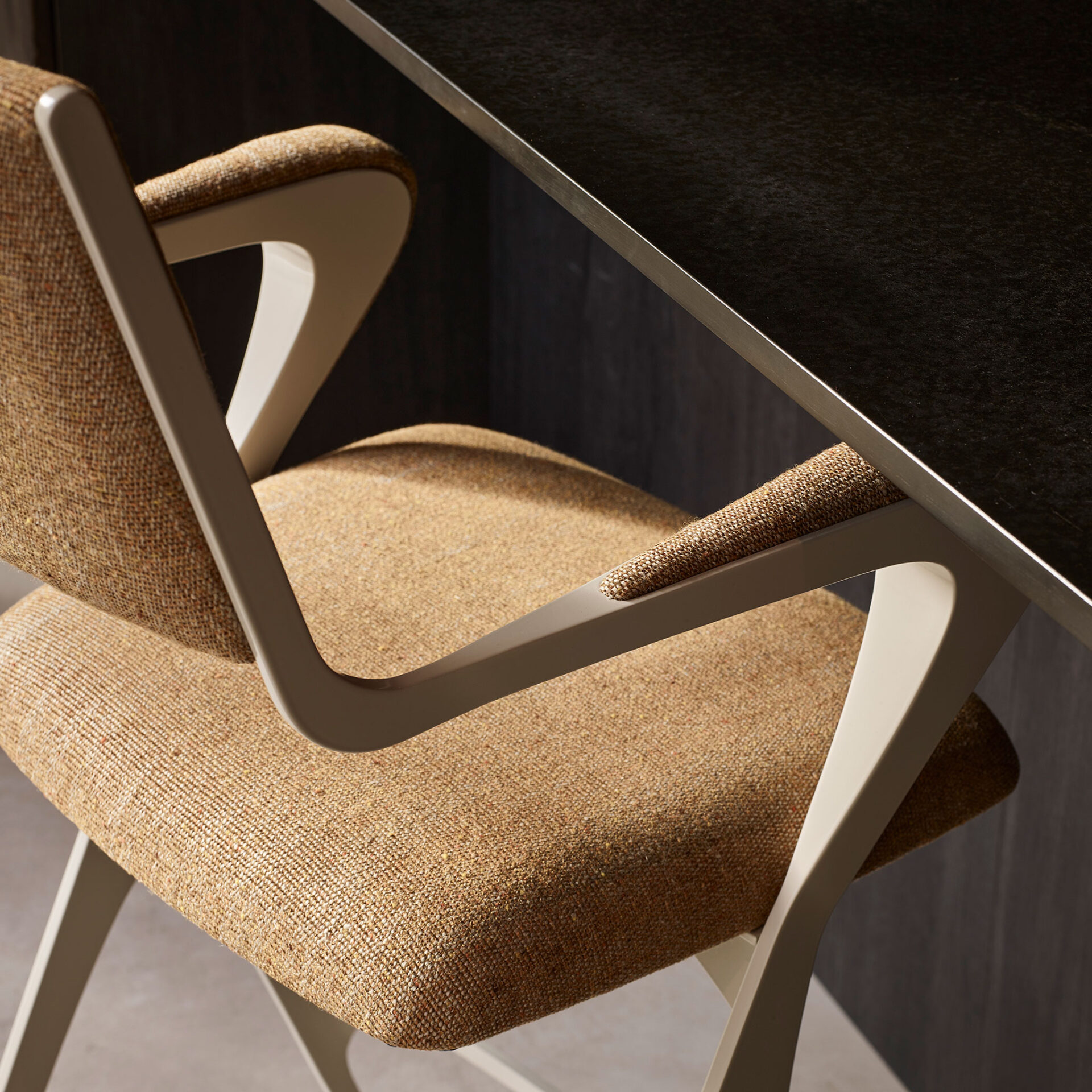 Vienna bar stool finished in Stone Grey with C.O.M. fabric