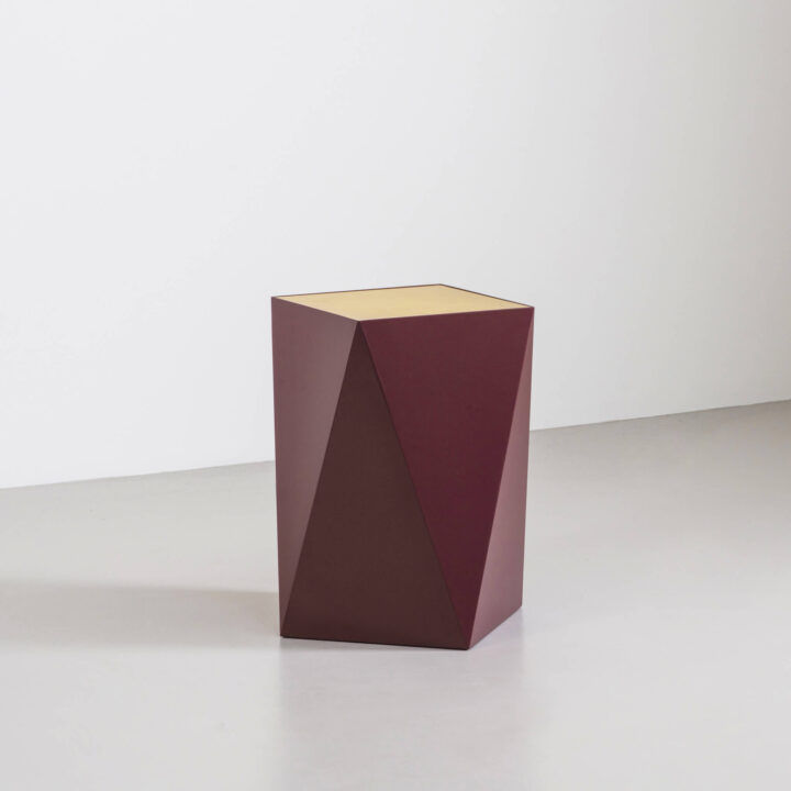 Finished in "Bridge Red" with a Polished Brass top