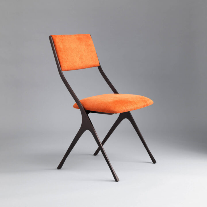Finished in "Bronze" with GP & J Baker upholstery in 'Terracotta'